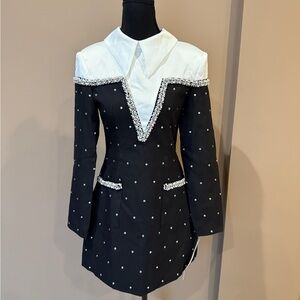 Chic Black and White Mini Dress with Pearl Accents